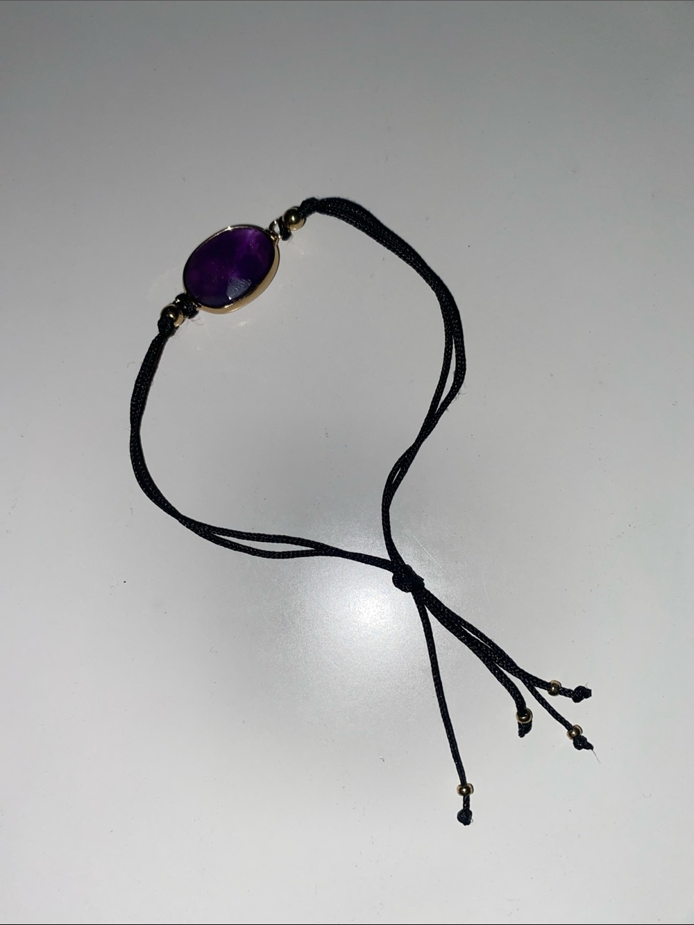 Adjustable Black Cord Bracelet with Purple Gemstone Accent